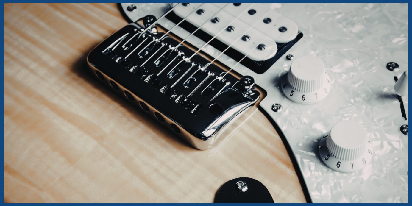 Close-up of guitar bridge and pickup